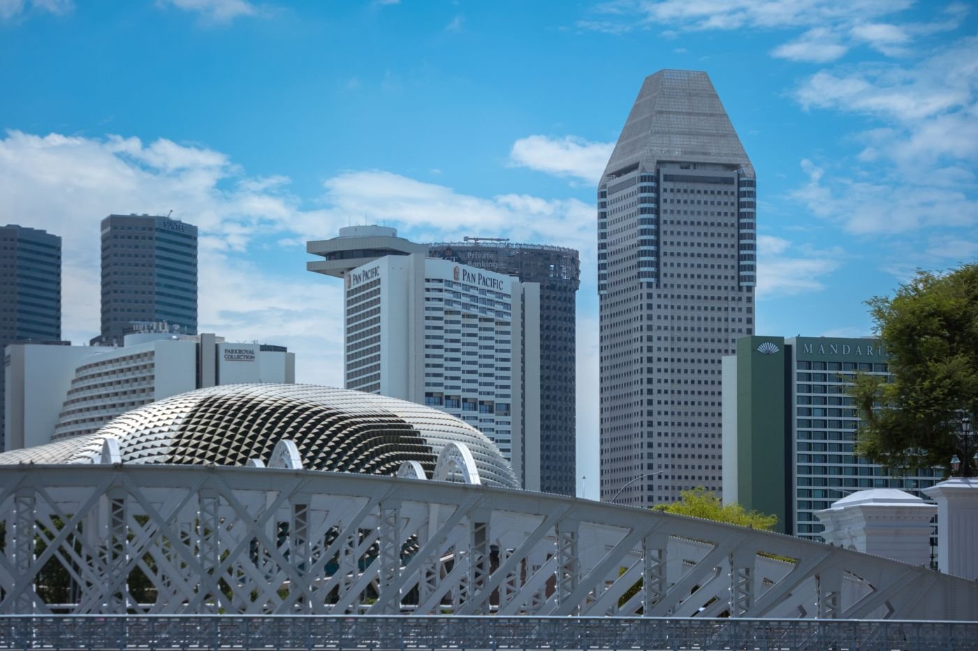 Singapore skyline of commercial towers under a clear sky